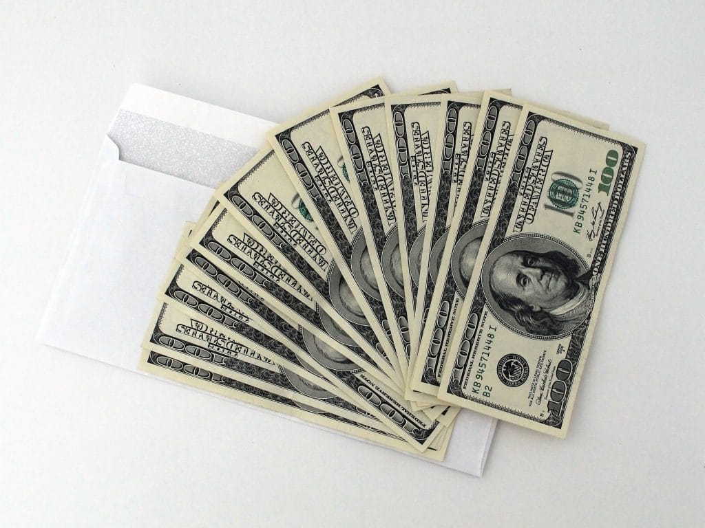 100 dollar bills fanned out